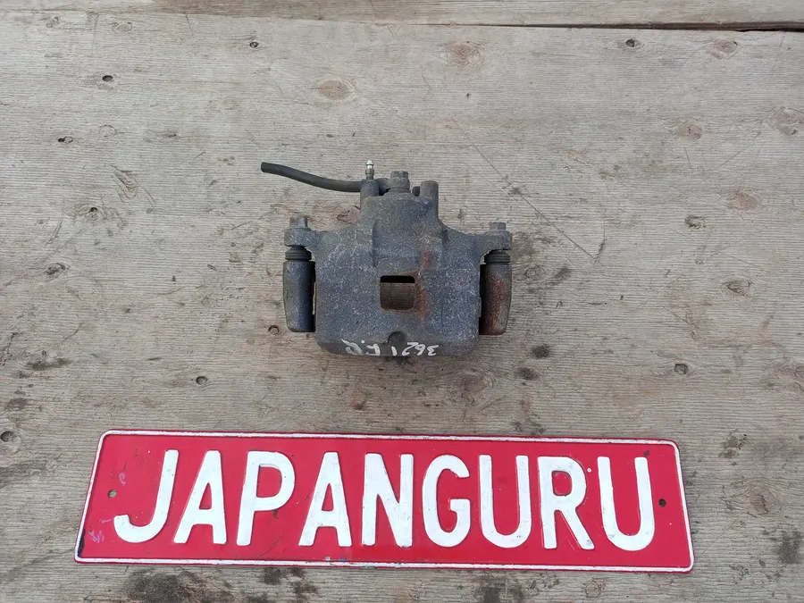 Суппорт тормозной Mitsubishi Lancer 10
